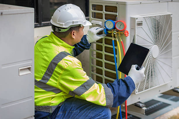 Professional Heat Pump Repair technician working in Milligan, FL